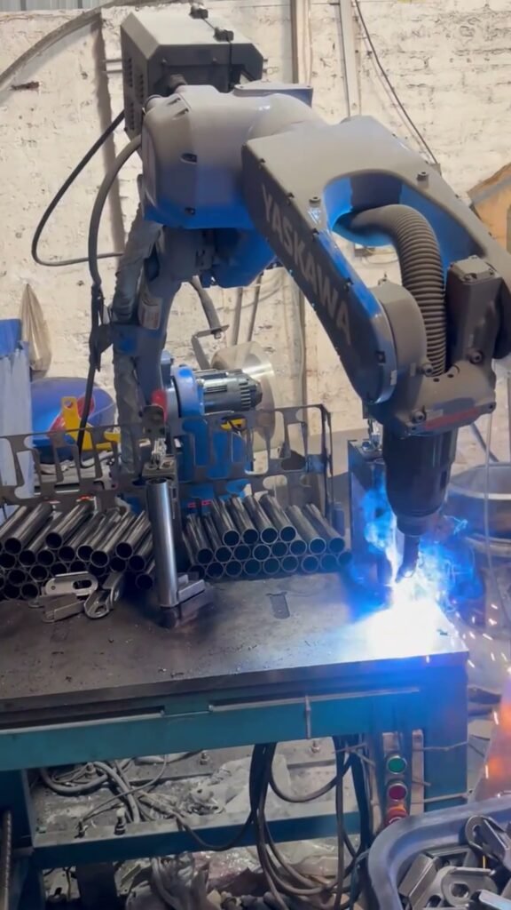 Robotic welding fixture used for tubular motorcycle parts